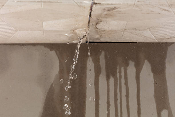 Professional Flood Damage Cleanup technician working in Beach City, TX